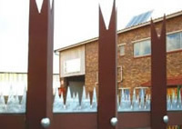Residential gate with spikes for additional security